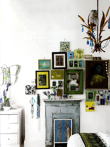 gallery wall inspiration with emerald green distressed frames