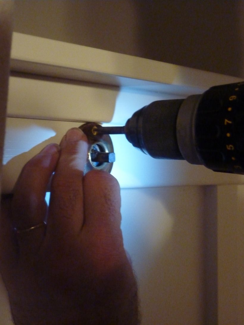 how to screw a doorknob hook into board and batten